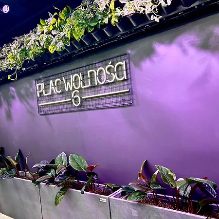Апартаменти Pl. Wolnosci 6 *