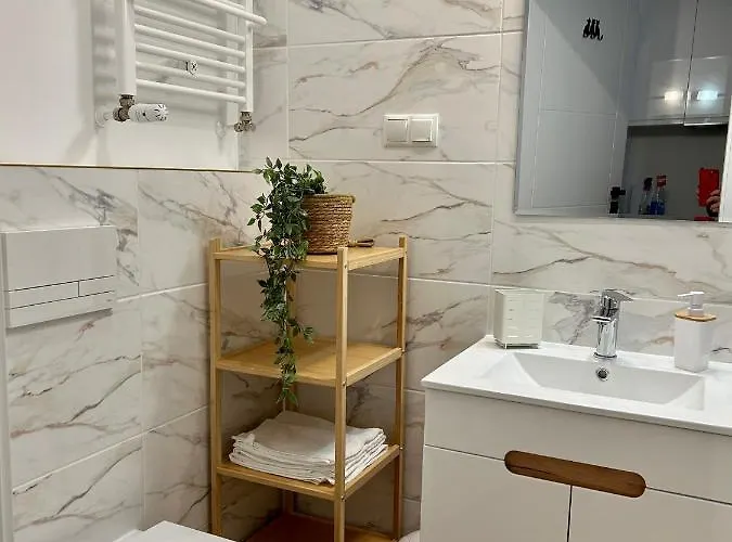 Апартаменты Pl. Wolnosci 6 Познань